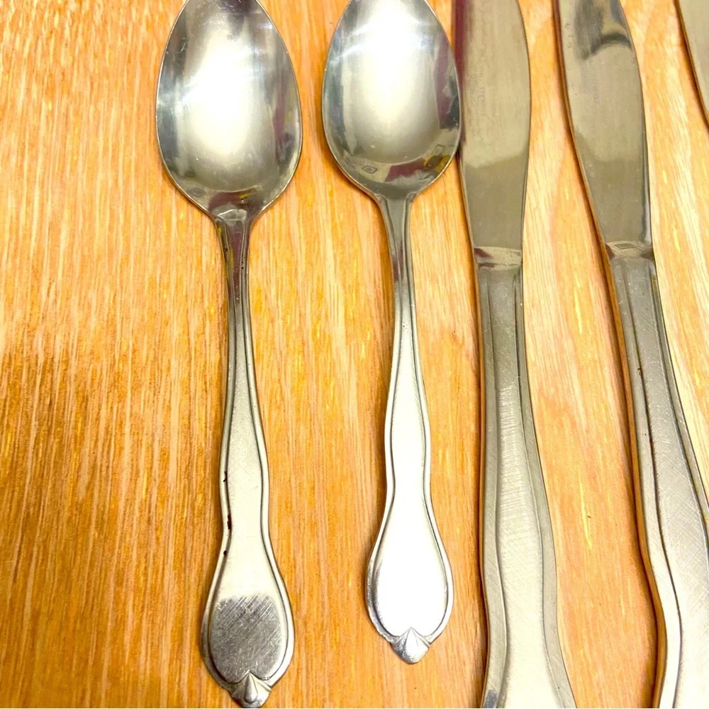 Cambridge Stainless Steel Flatware 3 Knives and 2 Spoons.